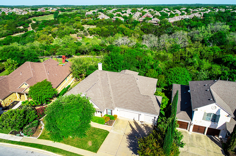 aerial-drone-view-above-suburb-homes