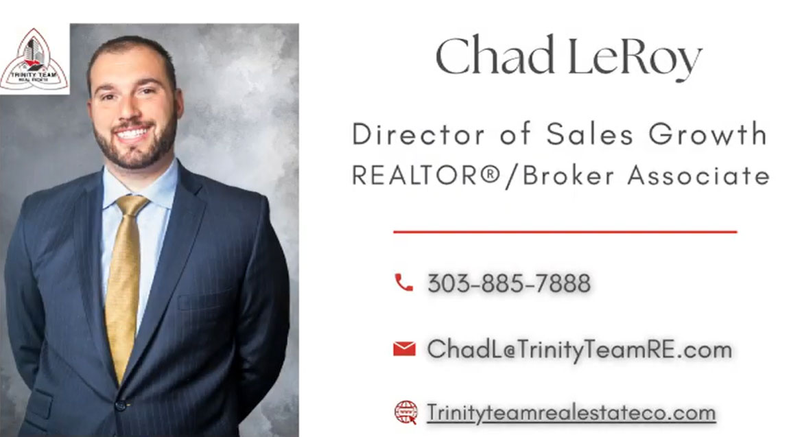 Bright modern living room with large windows and fireplace