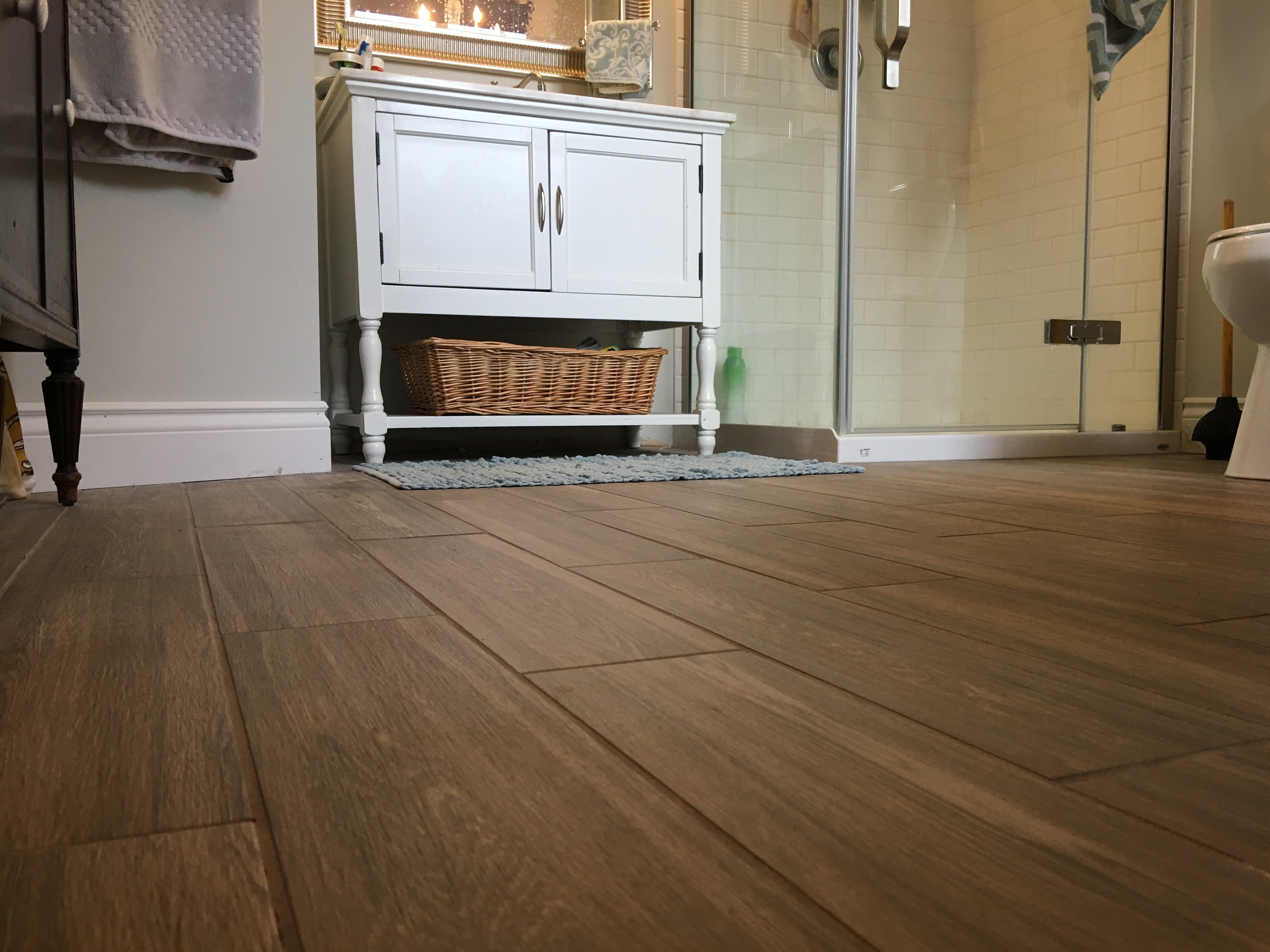 Porcelain Plank Floor Beautiful bathroom with wood-look floor