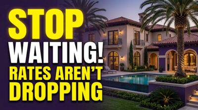 Classic Mediterranean Beverly Hills mansion at dusk with large text overlay "STOP WAITING! RATES AREN'T DROPPING"