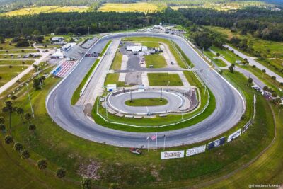 "NewSmyrnaSpeedwayAerialpic" by Adam53Rick is licensed under CC BY-SA 4.0. To view a copy of this license