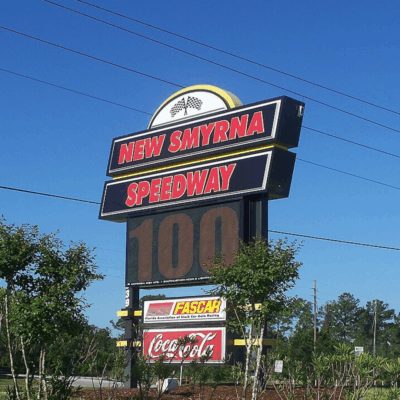 "New Smyrna speedway sign01" by Ebyabe is licensed under CC BY 2.5.