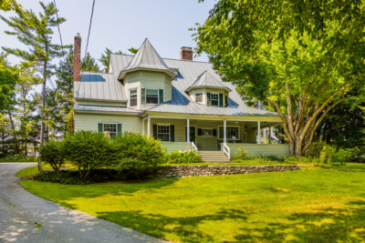 Front exterior of The Carleton House at 4 Occom Ridge, a historic 1897 shingle-style home in Hanover, NH with river views and walkable access to Dartmouth College.
