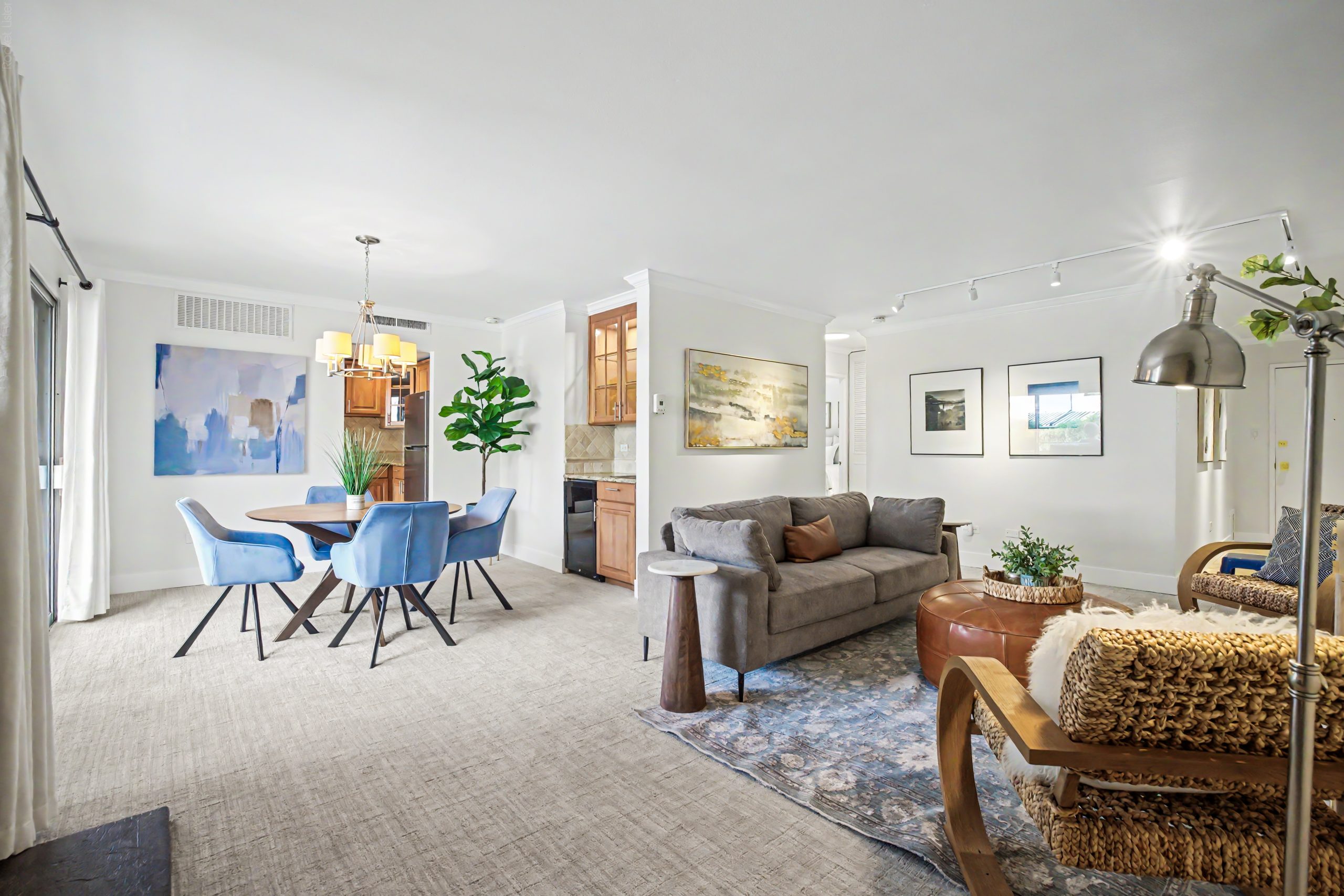 Living and dining area of a Governor's Park condo at 700 N Washington St, Denver