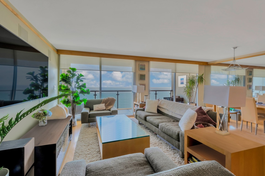 Living room with TV in an Ocean Avenue home.