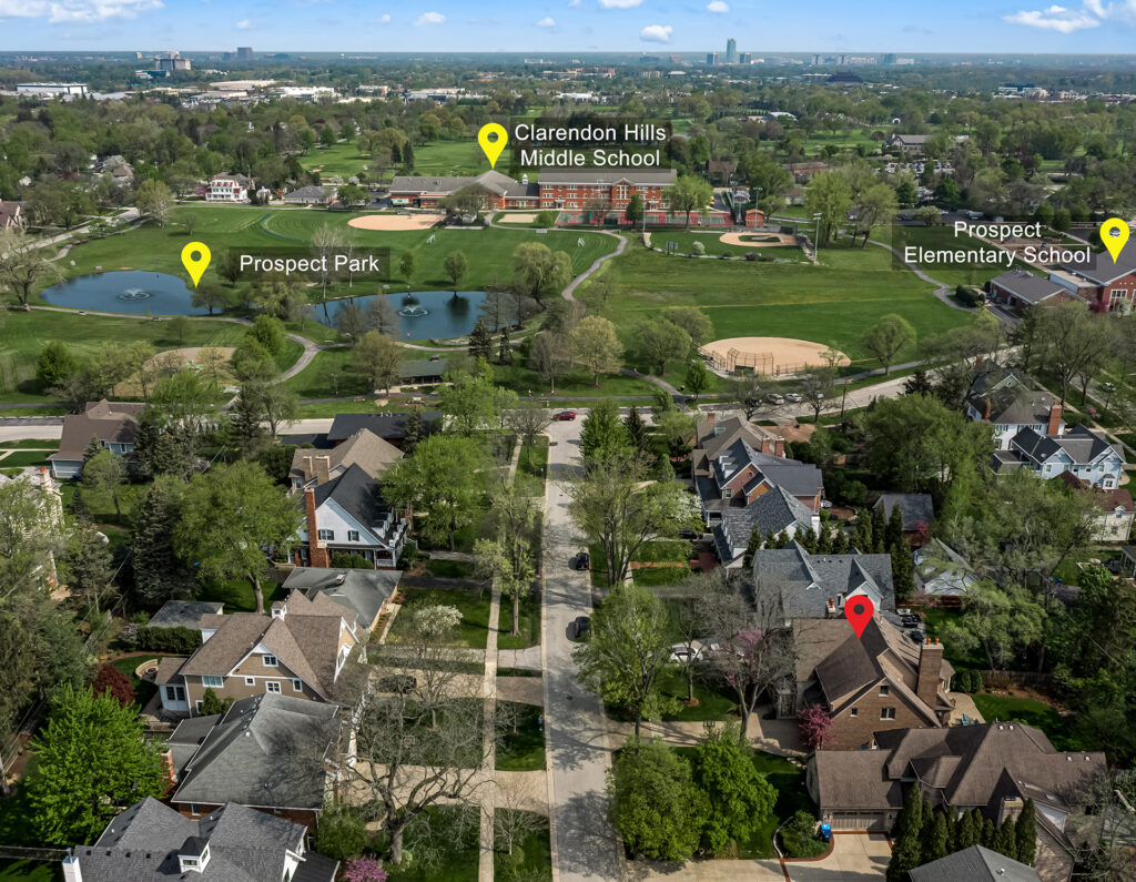 Luxury homes walk to park and school on a tree-lined street in Clarendon Hills, Illinois, showcasing high-end architecture, walkability and curb appeal