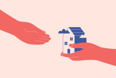 hand gives another hand small house