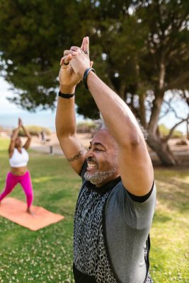 Active residents practicing yoga and enjoying an Active Coastal Lifestyle