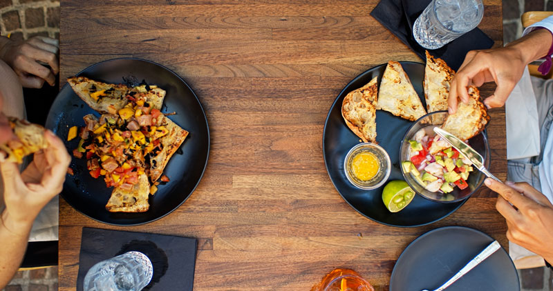 Flatlay of a couple dining in Cambrian Park