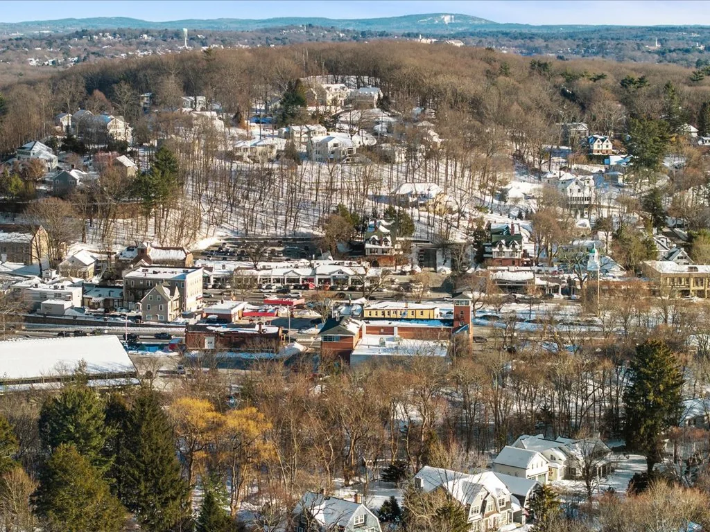 Wellesley vs. Weston: aerial view of a Wellesley village center and surrounding neighborhoods