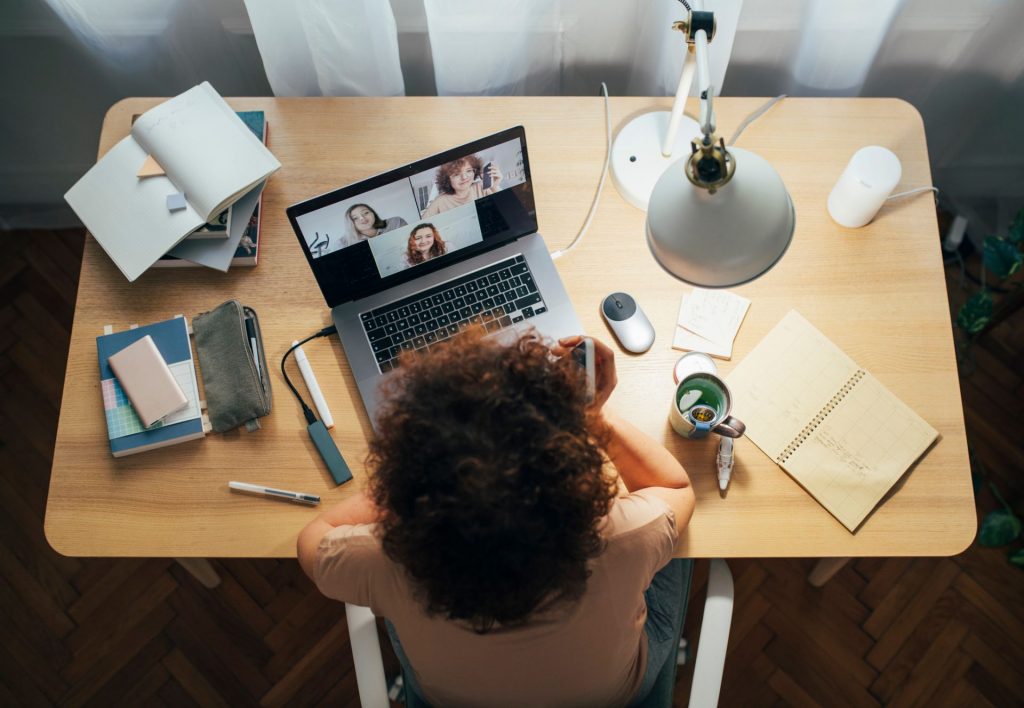 Woman sitting with laptop