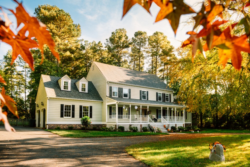 white single family home during the fall season