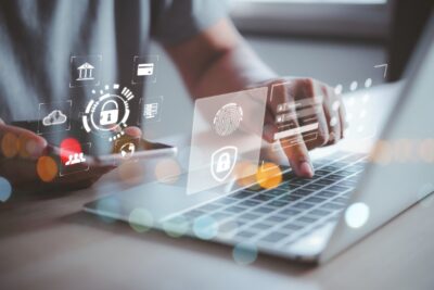 Businessman working with laptop and smartphone