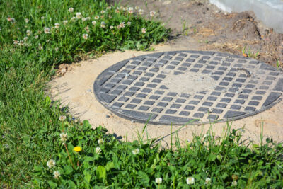 Manhole cover installation in the garden.