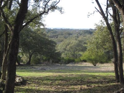 Walking Texas land in the Central Texas Hill Country with wooded acreage and open pasture terrain