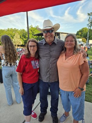 James Walker with Mayor Jane Hughson and community members at Summer in the Park in San Marcos Texas