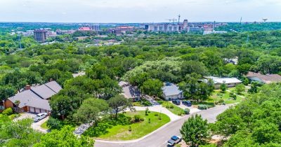 Aerial view showing established San Marcos neighborhood near Texas State University and Spring Lake