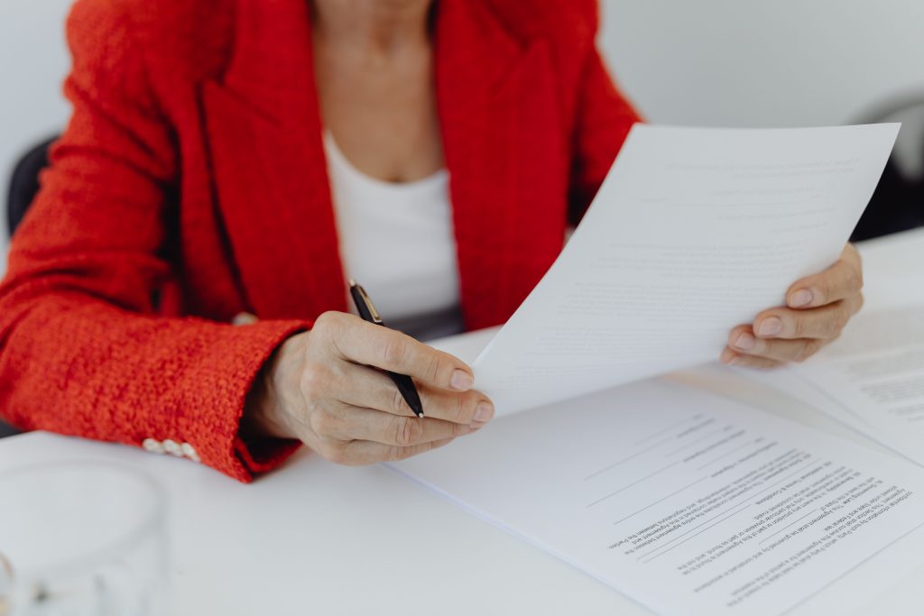 a person holding a document