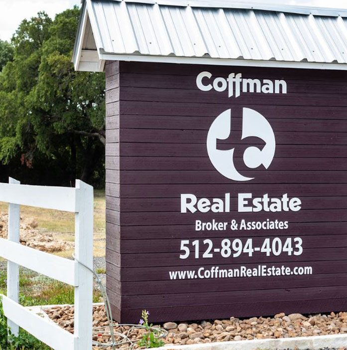 Coffman Real Estate office sign