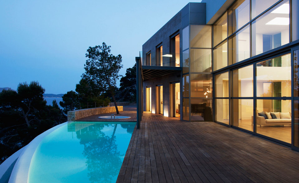 pool outside modern house at twilight