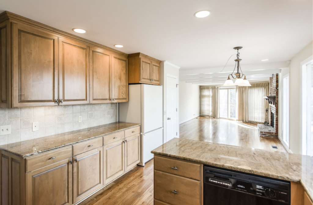 Wooden kitchen cabinets inside of an auction home