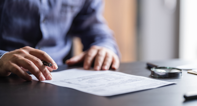 man filing form