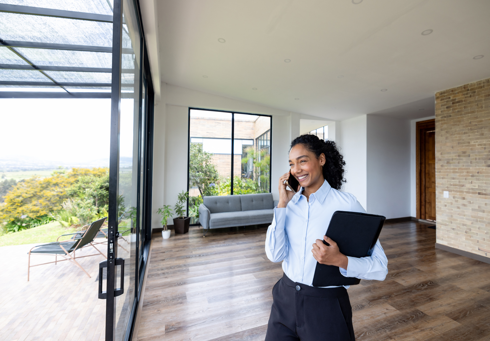 Real estate agent helping a buyer evaluate a home remotely