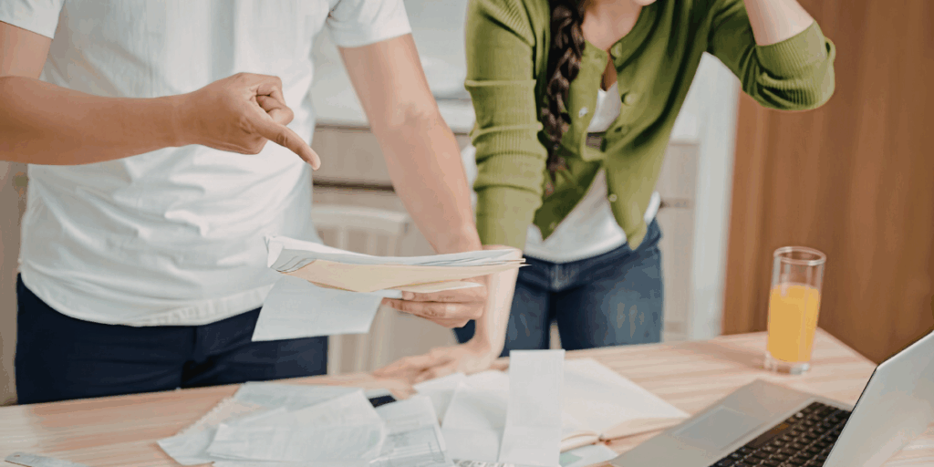 Couple reviewing finances before buying a home in Florida
