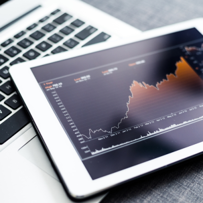computer and tablet with market trends