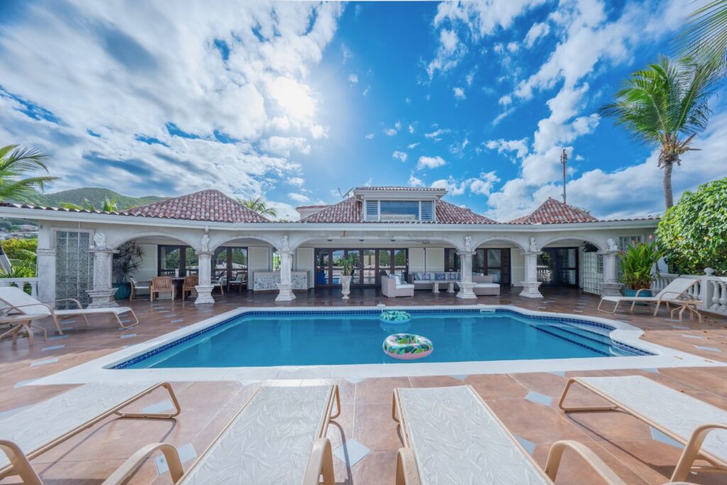 Orient Bay Real Estate, 4 Br walking distance to the beach  by SMI Realtors