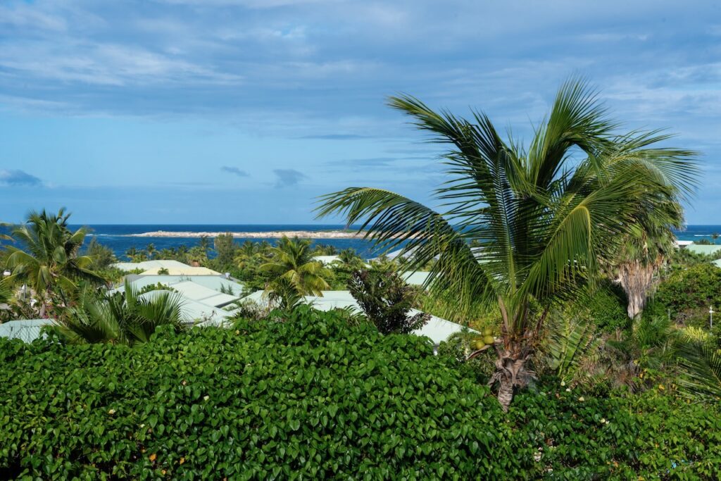 Orient Bay Real Estate, 4 Br walking distance to the beach  by SMI Realtors