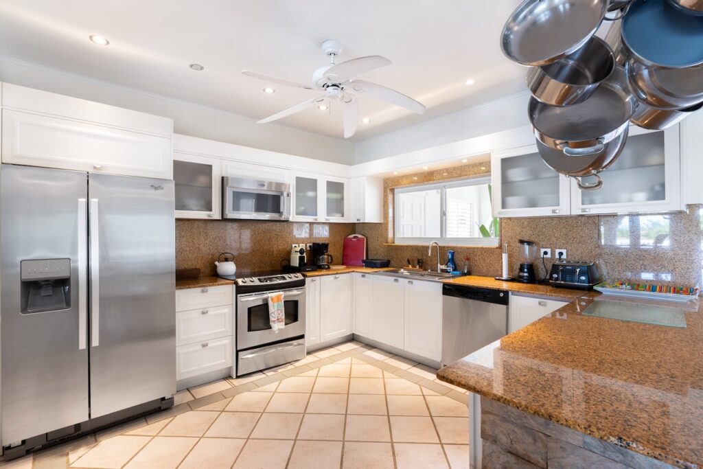 Orient Bay Real Estate, 4 Br walking distance to the beach  by SMI Realtors