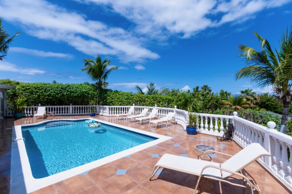 Orient Bay Real Estate, 4 Br walking distance to the beach  by SMI Realtors