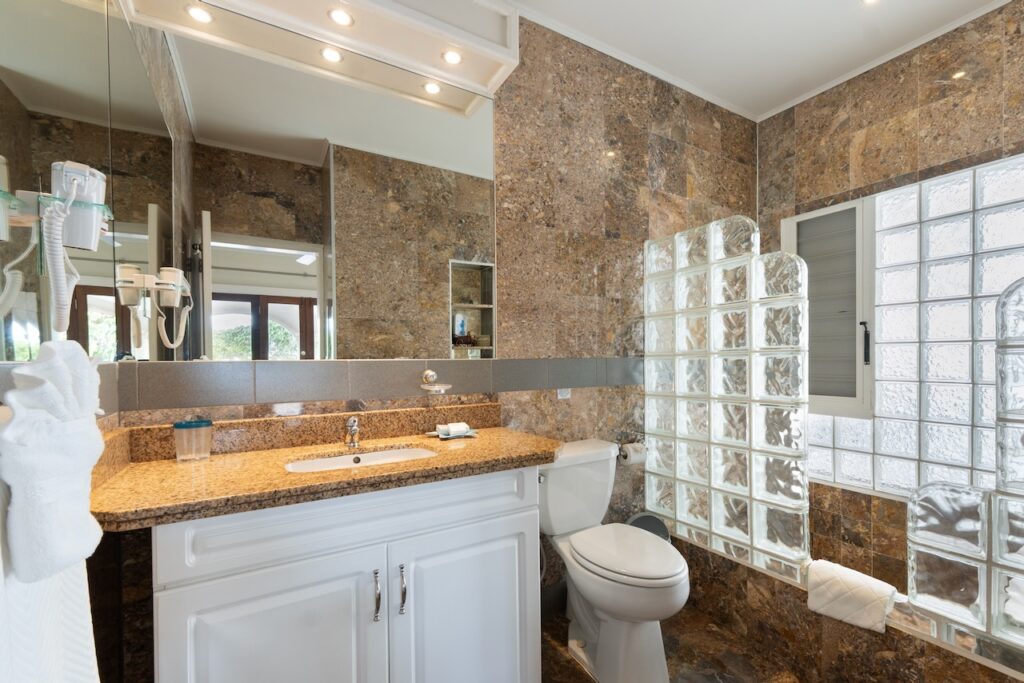 Orient Bay Real Estate, 4 Br walking distance to the beach  by SMI Realtors