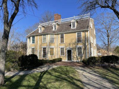 Attractive South Shore-style home with mature landscaping and strong curb appeal