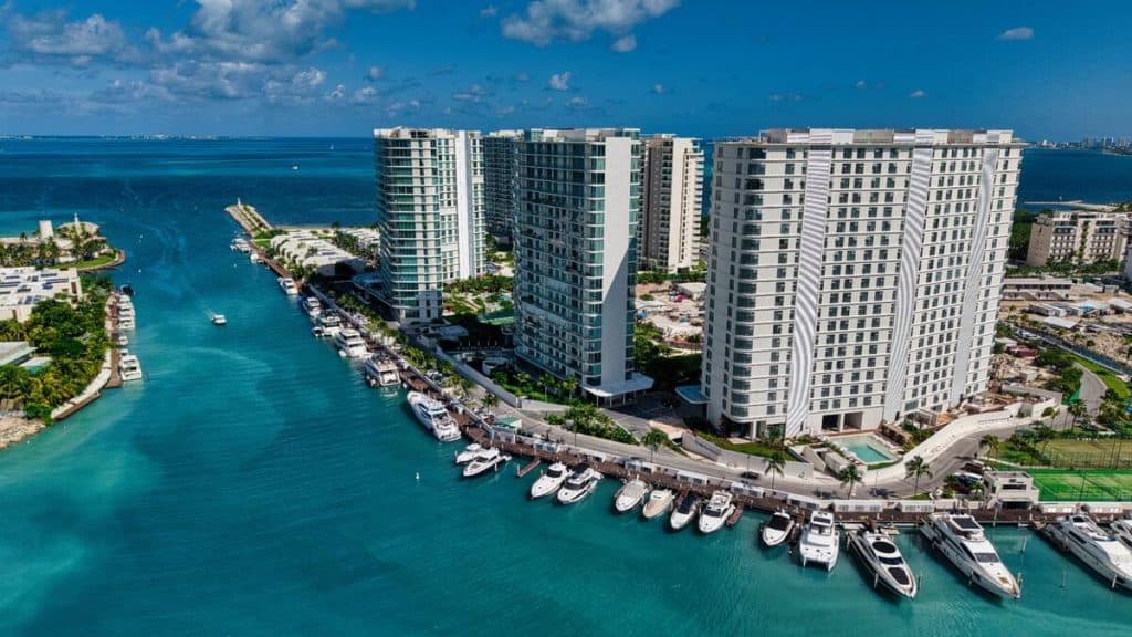 Modern high-rise luxury apartments overlooking the Caribbean Sea in Puerto Cancun.
