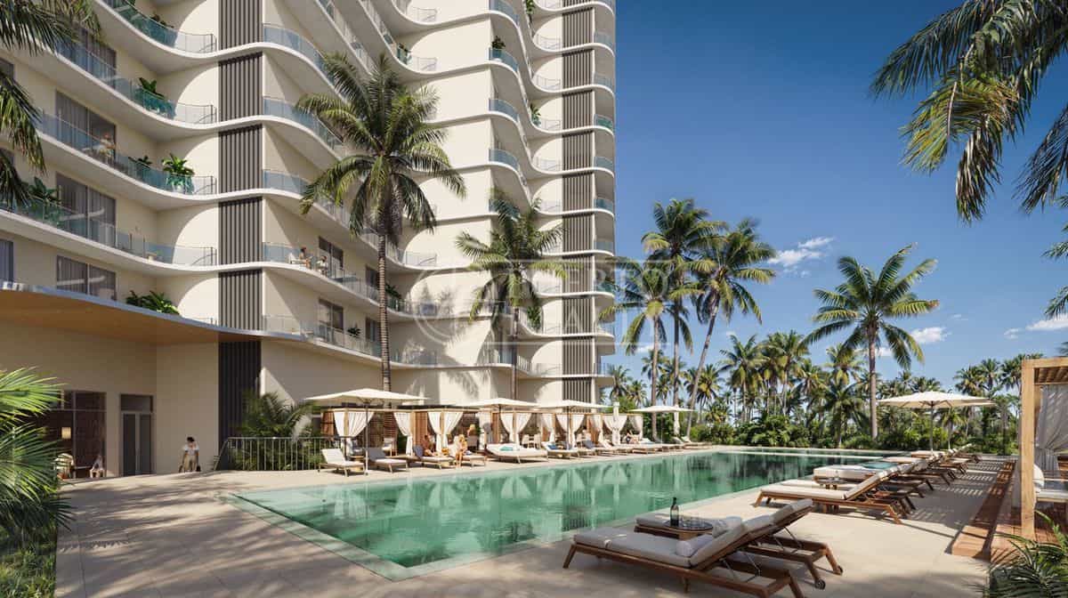Swimming pool overlooking the Caribbean Sea at Marina Condos residential complex.