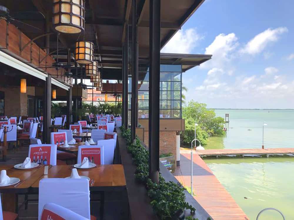 Puerto Madero Cancun, a modern high-end restaurant and open-concept dining area in Cancun