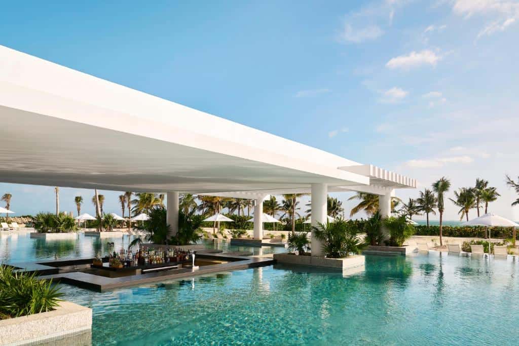Modern high-rise luxury apartments overlooking the Caribbean Sea in Puerto Cancun.