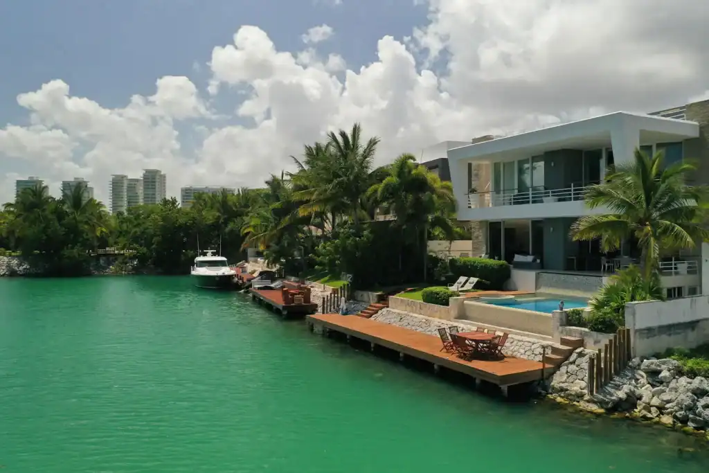 Modern contemporary oceanfront real estate listing on the coast of Cancun