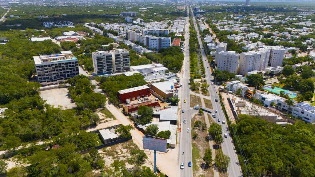 Sunny aerial view of the Huayacan Avenue