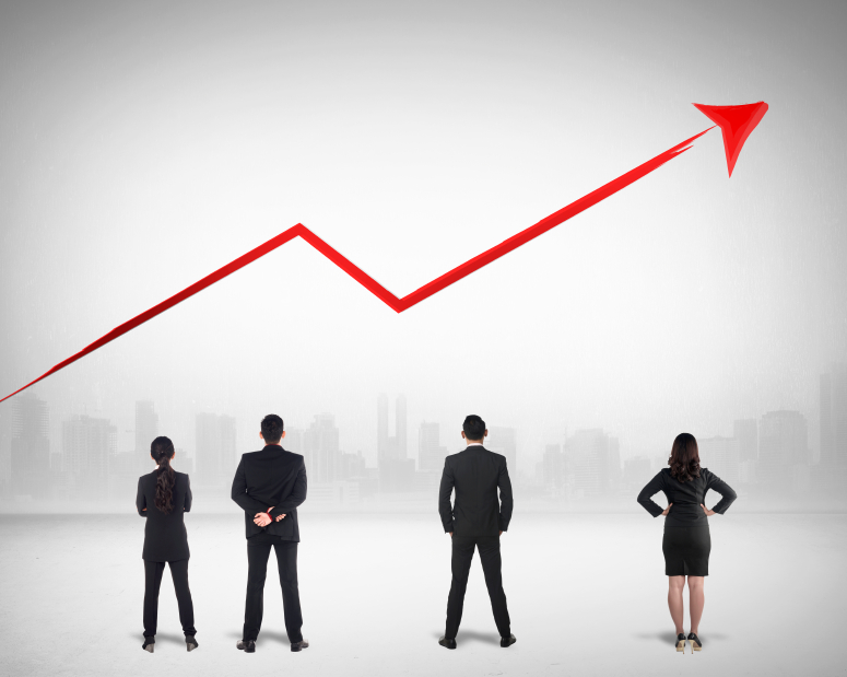 Business team watching sales grow up on the background