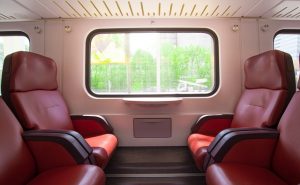 Image is of the inside of a commuter train.