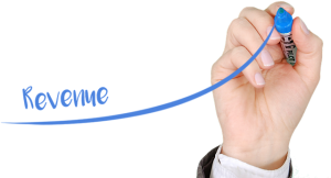 Image is a hand drawing a graph trending upward with the word 'revenue' beside it.