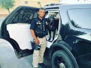 Image is a picture of Ronil Singh on duty.