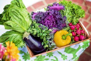 Image is a basket of garden produce.