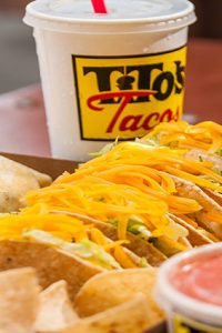 Image is a box of tacos an drink from Tito's Tacos in Culver City.