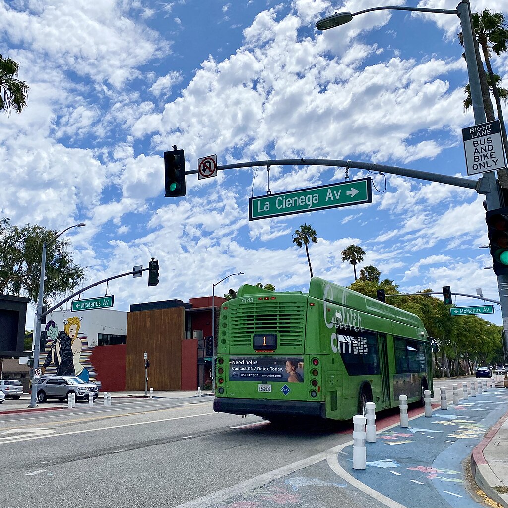 A Culver CitBus drives by a bus and bike only lane, where ABLE will detect illegal parking.
