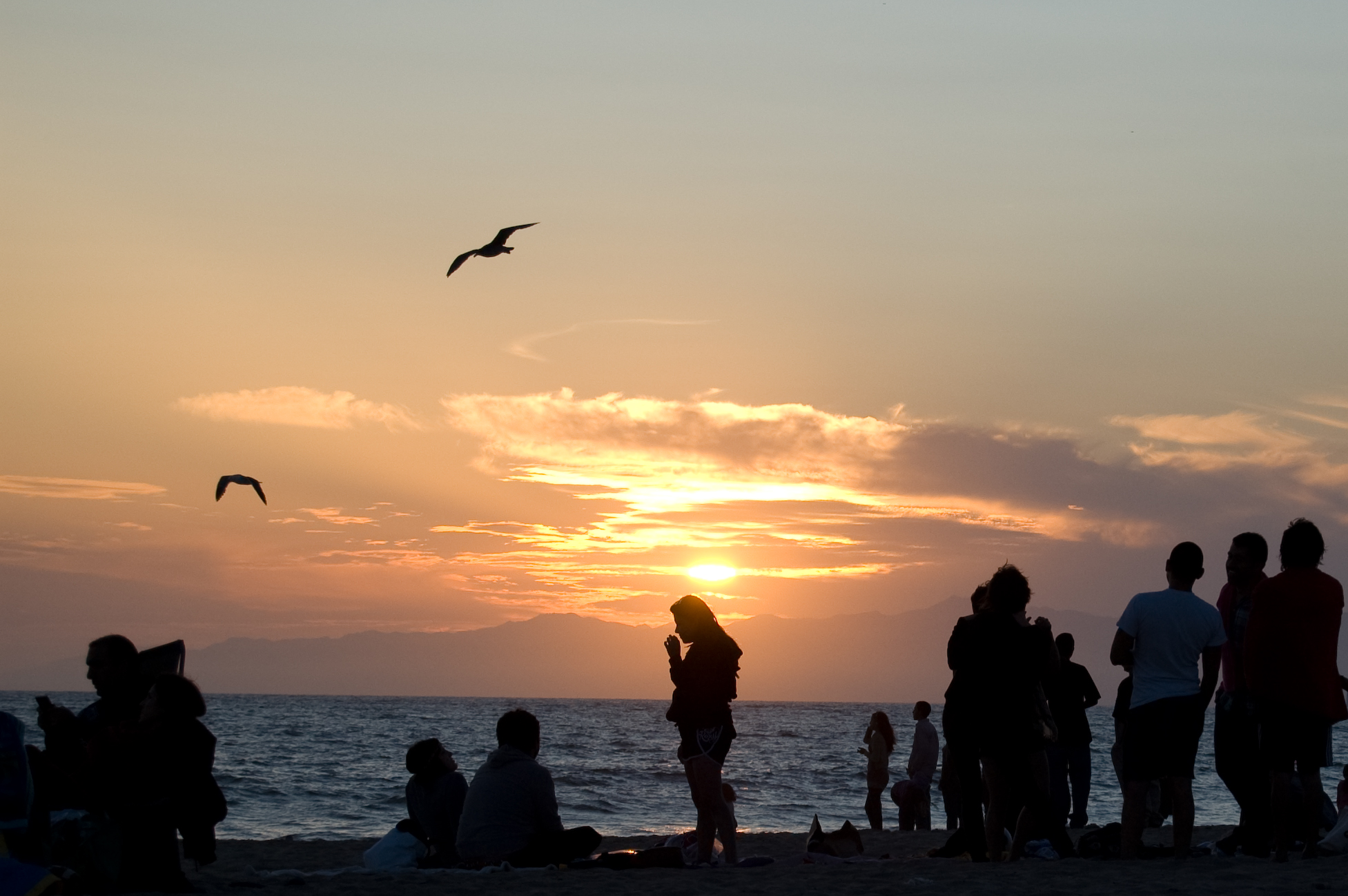 Sunset at Dockweiler Beach. Image from wikimedia commons.