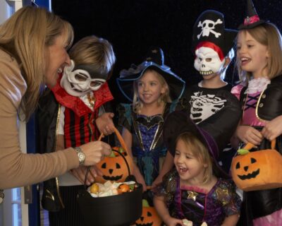 Children in costumes are Trick or Treating in the Los Angeles area.